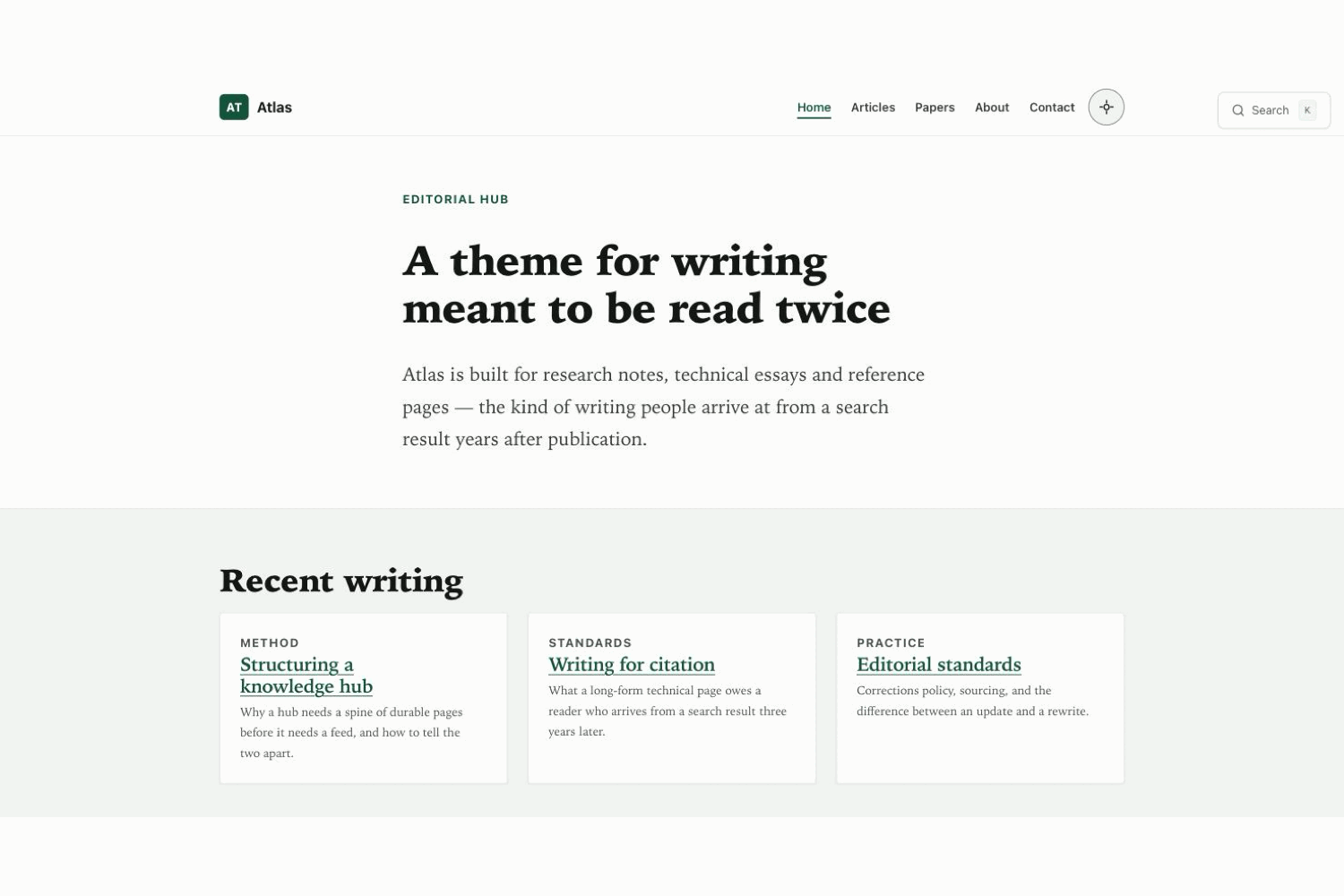 The Atlas home page: a serif headline over a standfirst, with three article cards beneath.